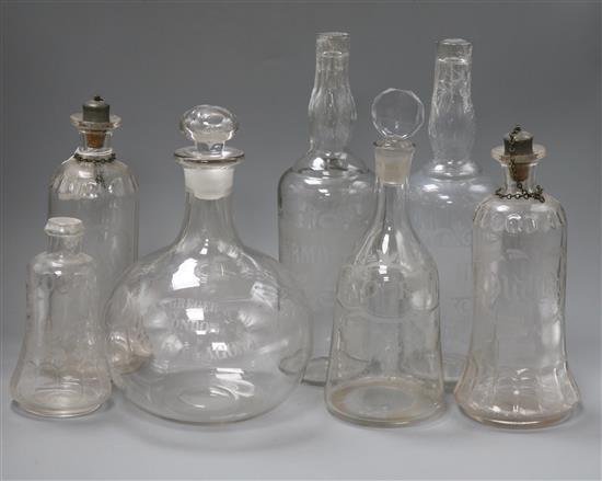 A quantity of glass decanters tallest 31cm